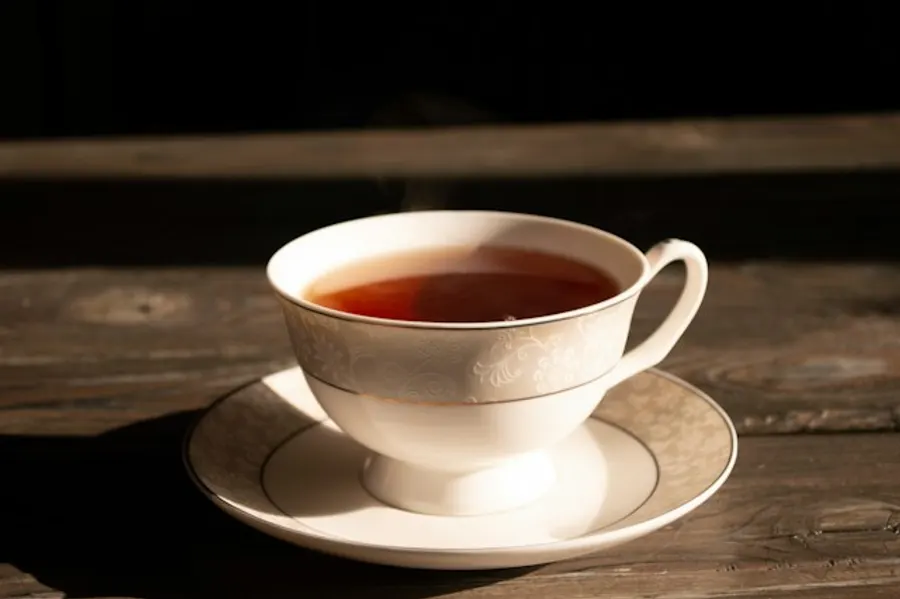 A glass of black tea.